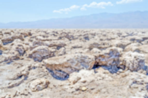 Defocused background of Devil's Golf Course in Death Valley, California. Intentionally blurred post production for bokeh effect