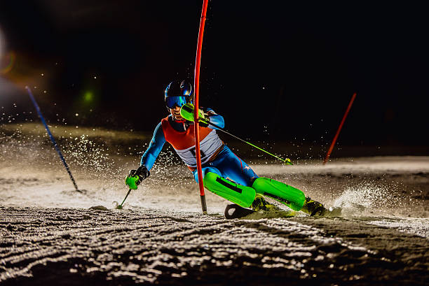 istock Night Shot of a Professional Alpine Skier Making Sharp Turn 499293592