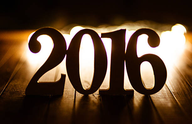 wooden 2016 New year text on christmas lights