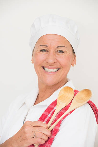 istock Smiling female cook happy portrait 499309522