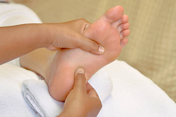 istock Reflexology Thai foot massage, spa foot treatment 499309710