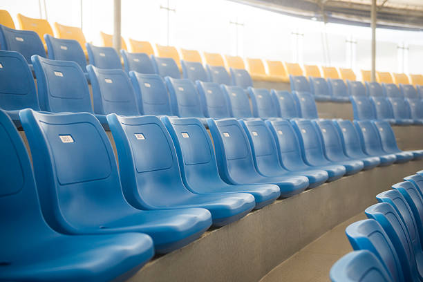 istock row of blue plastic chairs on the stadium 499312352