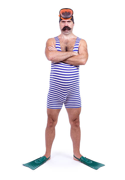 Man in swim dress standing with crossed hands Man in swim dress standing with crossed hands hairy fat man pictures stock pictures, royalty-free photos & images