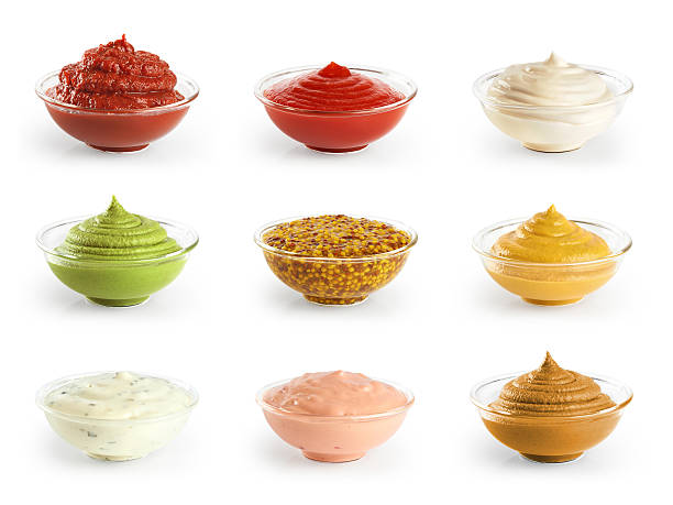 istock Bowls with sauces ketchup and mustard on white background. 499315934