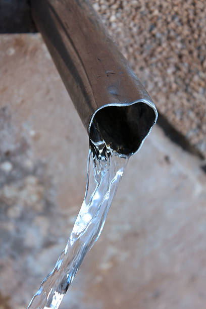 istock Drinking water and metal pipe 499316590