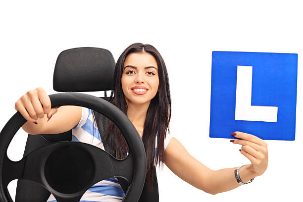 istock Young woman holding an L-sign 499316686