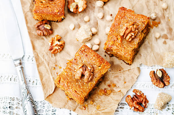 chickpeas walnuts blondies chickpeas walnuts blondies on a white background. toning. selective Focus blondy stock pictures, royalty-free photos & images