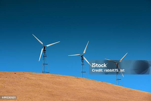Wind Turbine Stock Photo - Download Image Now - Generator, Green Technology, Hill