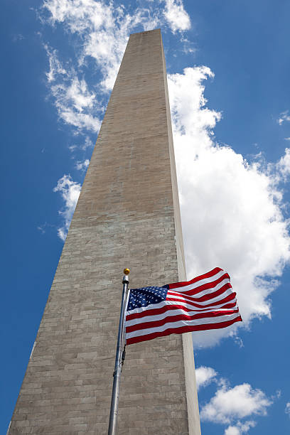 istock Obelisk with American Flag in National mall, Washington monument 499330593