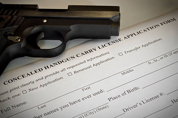 Concealed Handgun Permit Application Concealed Handgun Permit Application hiding stock pictures, royalty-free photos & images