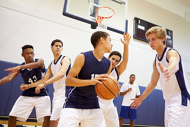 istock Male High School Basketball Team Playing Game 499331123