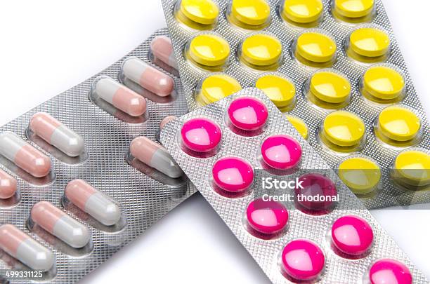 Pills And Capsules In Blister Packs Stock Photo - Download Image Now - Addiction, Antibiotic, Blister