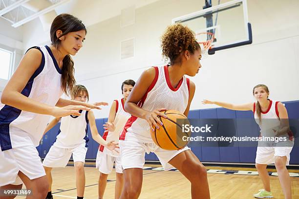 Female High School Basketball Team Playing Game Stock Photo - Download Image Now - Basketball - Sport, Sport, Basketball - Ball