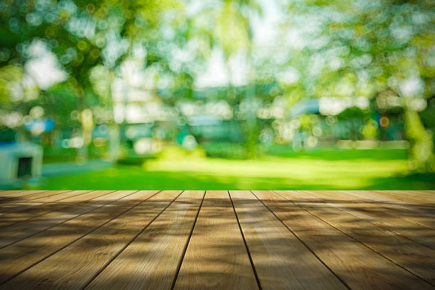 istock Perspective wood and bokeh light background 499332434