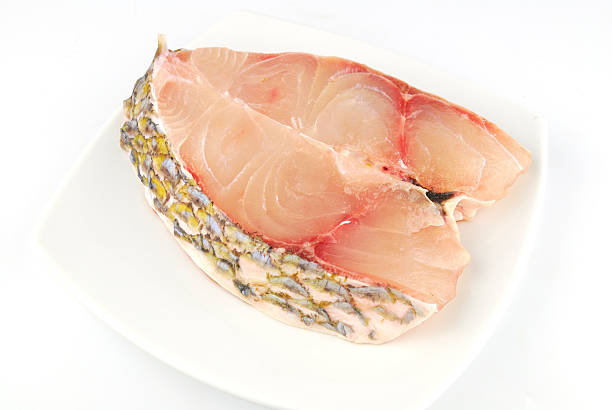 istock Fresh uncooked red fish meat fillet on white background 499332629