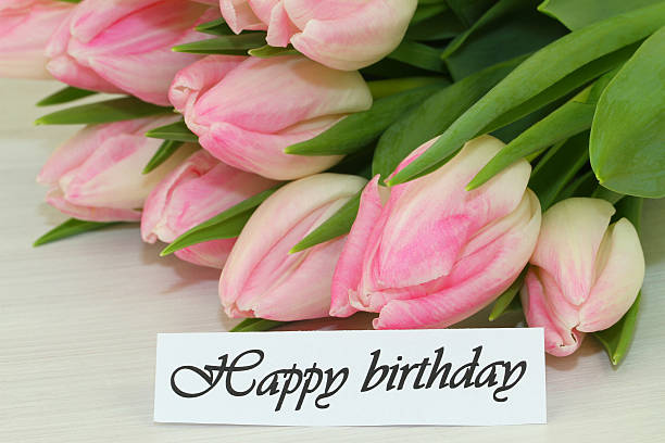 istock Happy birthday card with pink tulips 499332941
