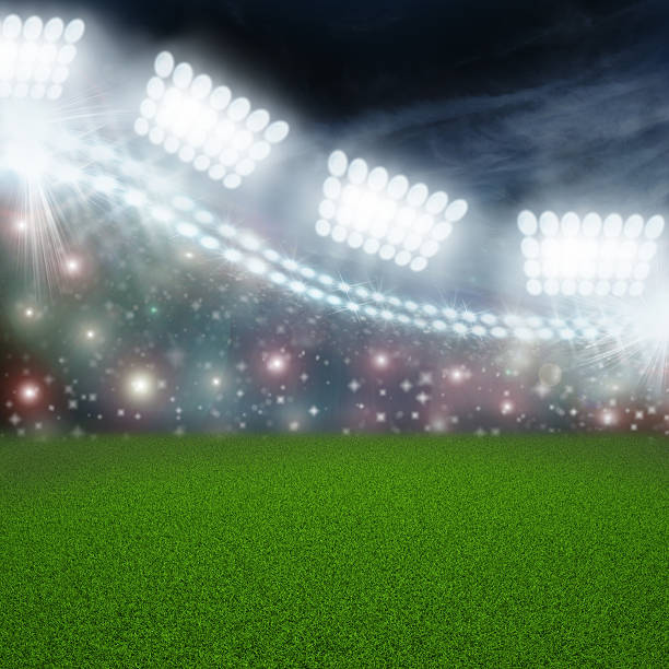 istock Soccer ball on green stadium arena 499333747