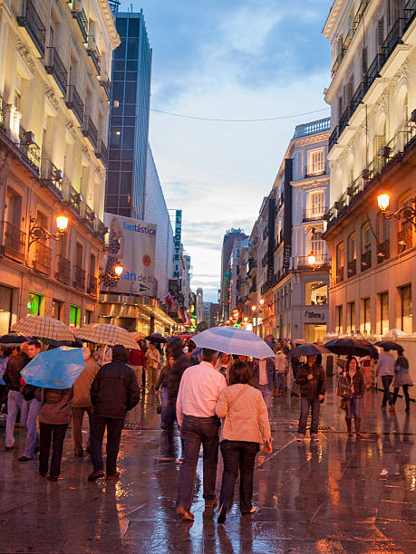 istock Puerta del Sol in the rain at night, Madrid 499335473