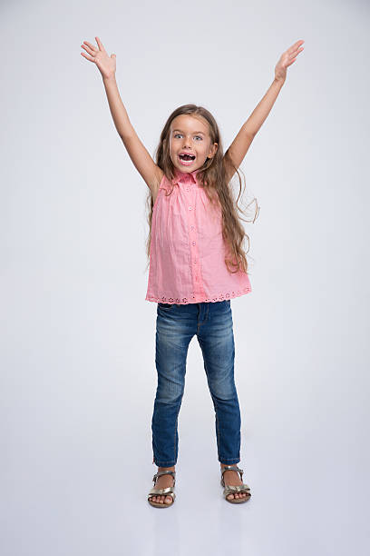 istock Cheerful little girl with expression emotions 499337440
