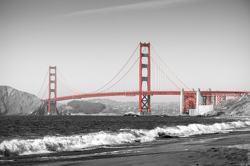Red Golden Gate Bridge in San Francisco, black and white filter.