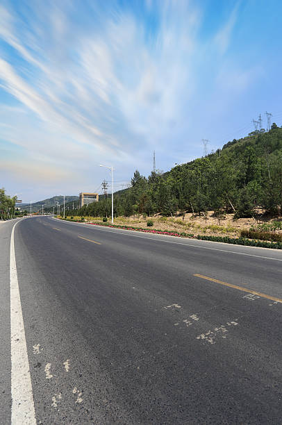 istock modern city road and traffic 499342570