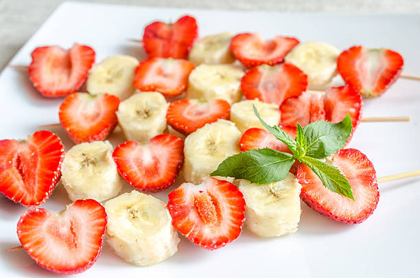 istock Fresh strawberry and banana skewers 499356443