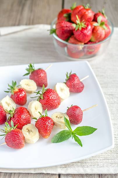 istock Fresh strawberry and banana skewers 499356445