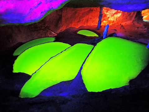 Dripstone cave Can Marçà, with fluorescing basins