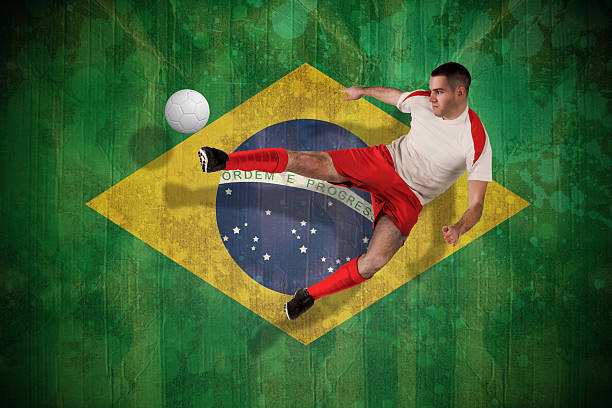 istock Fit football player playing and kicking 499358955