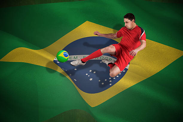 istock Fit football player jumping and kicking 499358981