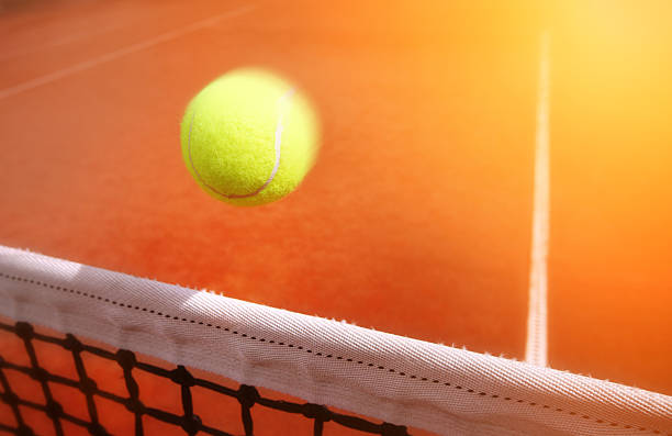 istock .Tennis balls on Court 499359119