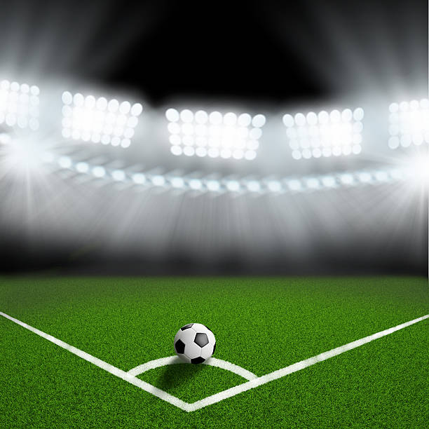 istock soccer ball on the green field corner 499359899