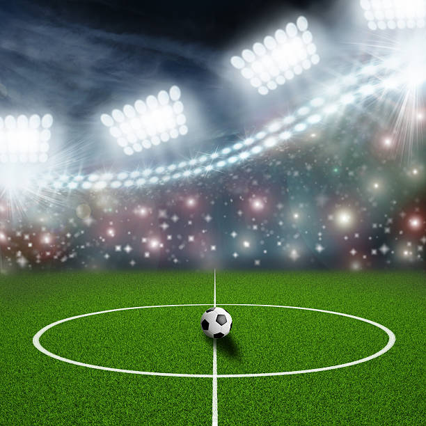 istock soccer field center and ball 499360119