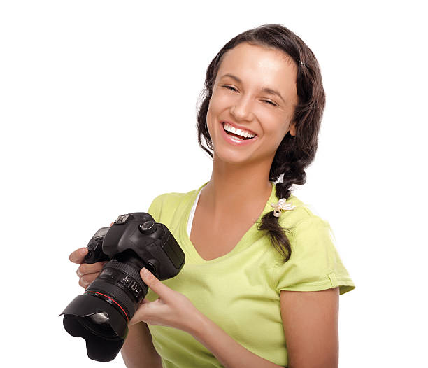 istock Young woman with camera.Isolated on white background 499362481