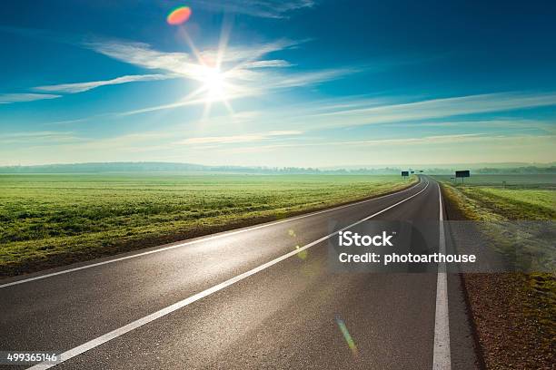 Sunny Road Stock Photo - Download Image Now - Road, Long, Thoroughfare