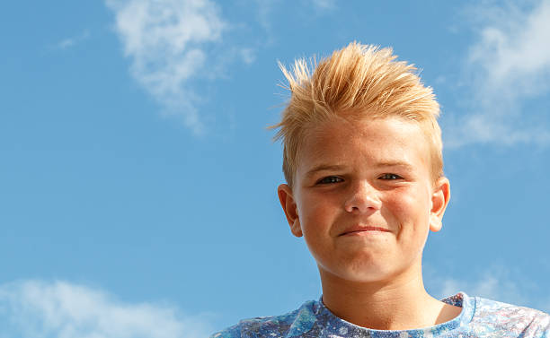 Teenage Boy With Spiky Hair Stock Photo - Download Image Now - Blond Hair, Spiky  Hair, 14-15 Years - iStock