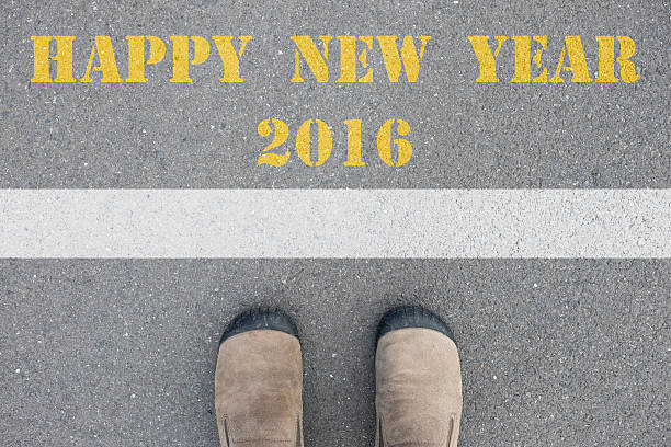 istock Shoes standing at happy new year 2016 line 499368294