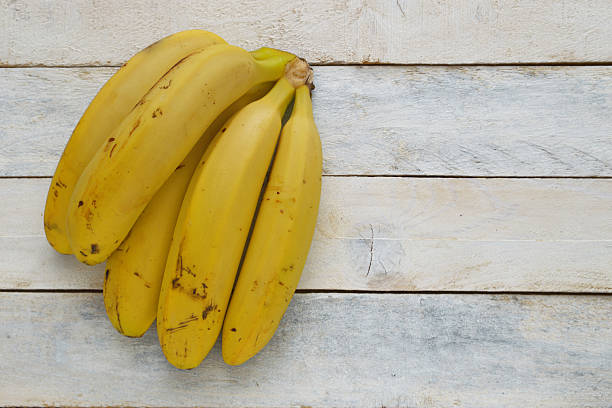 istock Banana on a white wooden table. 499368992