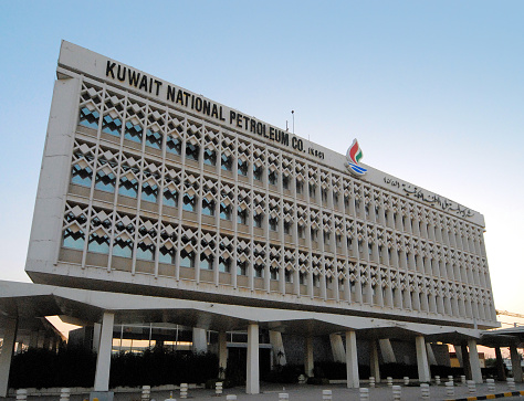 Kuwait city, Kuwait - August 1, 2006: empty street by building of the Kuwait National Petroleum Company