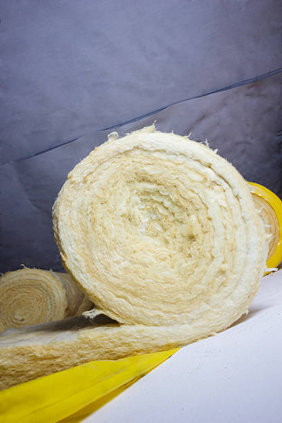 istock thermal insulation role in yellow package at attic background 499369266