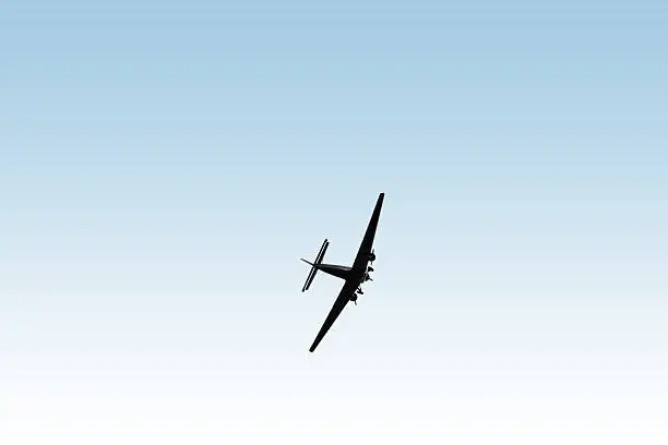 The Junkers Ju 52/3m, a three-engine airplane in front of a homogenous background.
