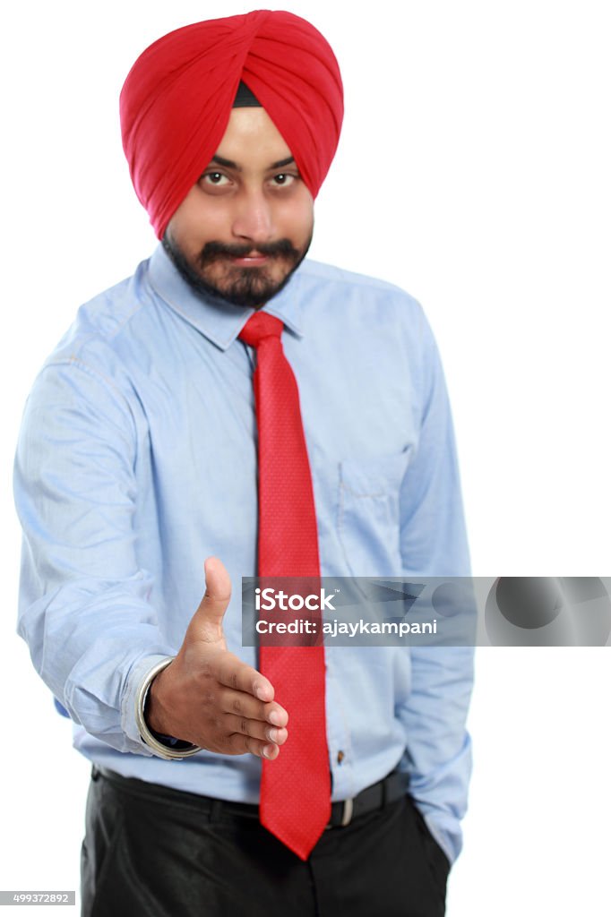 Welcome Portrait Of Happy sikh Businessman Offering Handshake Over White Background 2015 Stock Photo