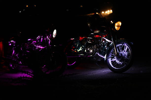 istock two motorcycles with illuminated at night in the mountains 499375450