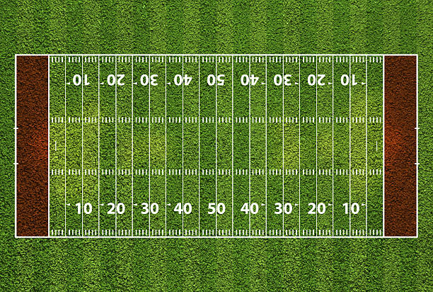 istock American football field with hash marks and yard lines. 499378071