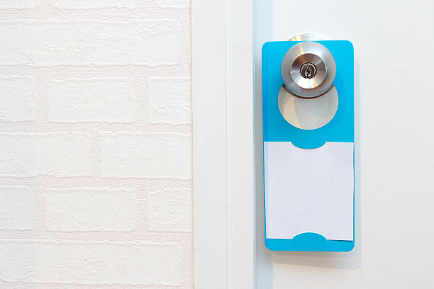 istock blank door hanger on a door 499378428
