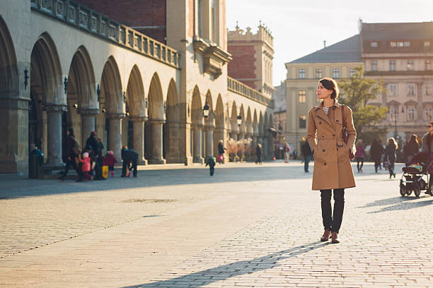 istock Woman walking on Main Market Square in Krakow. 499379966