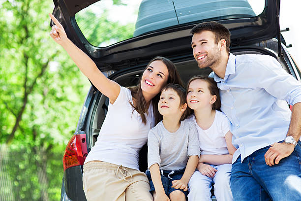 istock Family with a car 499380285
