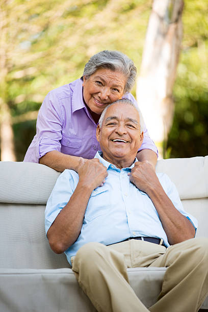 istock Mexican wife hugging husband 499383005