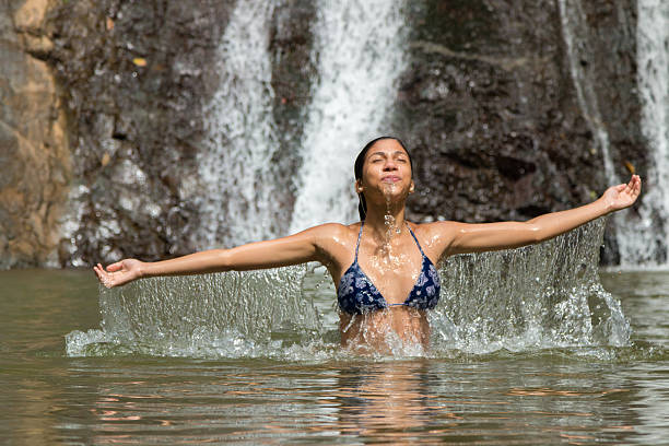 istock Girl on water 499384097