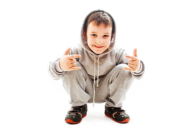 Little boy gesturing Little boy gesturing.  Isolated on white background rap kid stock pictures, royalty-free photos & images